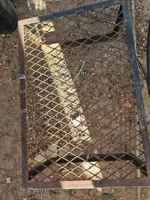 Metal wood holder rack and a metal folding fire grate