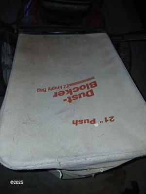 Craftsman 6.5 horsepower Briggs & Stratton 21" Mower Mulcher with bag, oil, and gas can