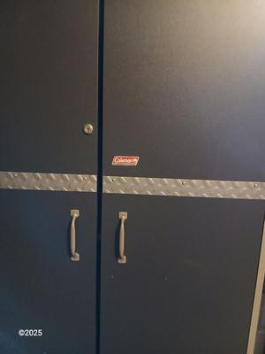 Coleman storage shelf with double doors - capability of locking
