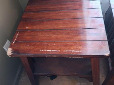 Two wooden end tables - one has damage on the corner