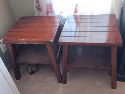 Two wooden end tables - one has damage on the corner