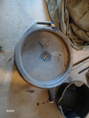 Auto cover with Jack, oil pans, gas can and a trailer hitch
