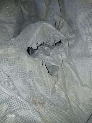 Auto cover with Jack, oil pans, gas can and a trailer hitch