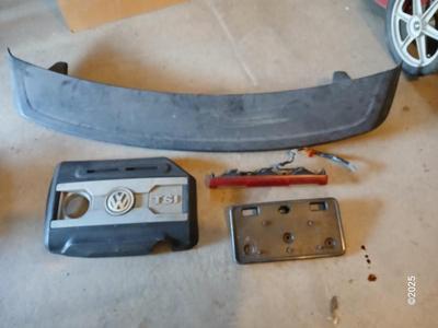 Auto parts - Spoiler - VX TSI Panel, license plate mount, and a taillight