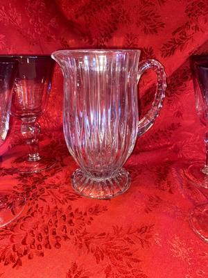 CRYSTAL PITCHER AND LARGE GLASS STEMMED GLASSES WITH PURPLE RIM