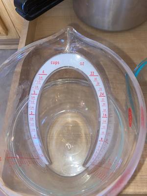 PRESTO PRESSURE COOKER, SERVING/SLASH MIXING BOWLS, AND AN OKO LIQUID MEASURING CUP