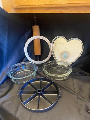 BRAND NEW NORDIC WARE BAKING DISH, GLASS PIE PANS, ROLLING PIN, PIE CRUST PROTECTOR, HEART SHAPED CAKE PAN AND COOKIE CUTTERS
