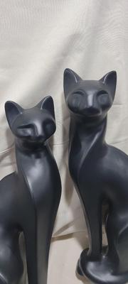 Pair of Maddux black ceramic cats