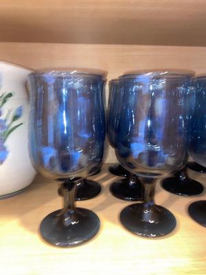 PRETTY BLUE STEMMED TUMBLERS AND CLAY FLORAL PRINT PITCHER