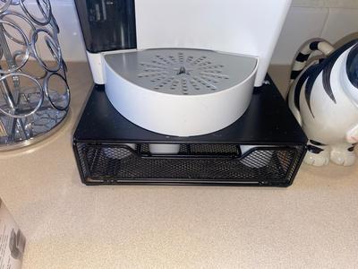 KEURIG COFFEE MAKER, KITTY CREAMER, AND TWO DIFFERENT COFFEE POD HOLDERS