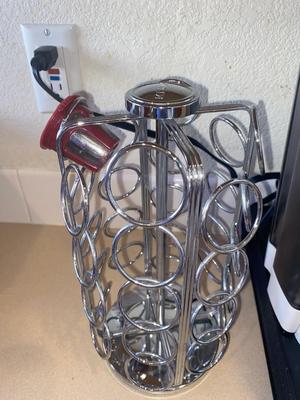 KEURIG COFFEE MAKER, KITTY CREAMER, AND TWO DIFFERENT COFFEE POD HOLDERS