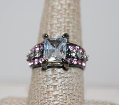 Size 9 Large Emerald Cut Stone with 22 Pink & Clear Accent Stone on a Black Tone Band (6.4g)