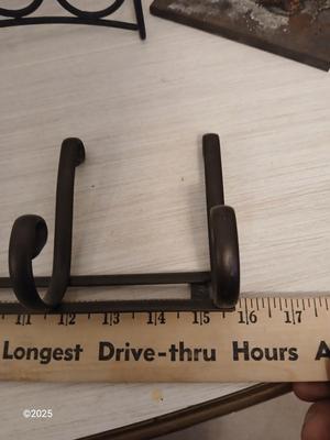 Assortment of metal organizing racks - Hooks - Coffee pod organizer and more