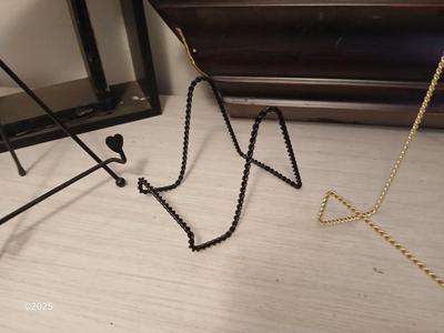 Wall shelf, wall ledge, picture frames and three plate stands