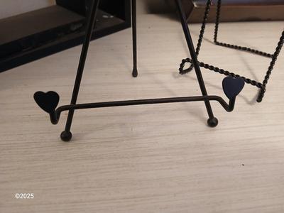 Wall shelf, wall ledge, picture frames and three plate stands