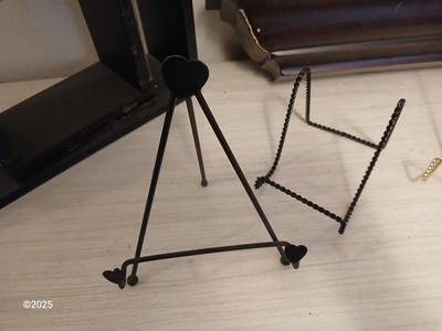 Wall shelf, wall ledge, picture frames and three plate stands