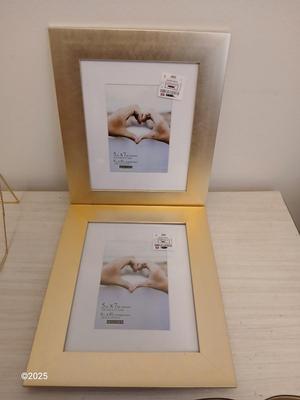 Wall shelf, wall ledge, picture frames and three plate stands