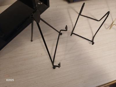 Wall shelf, wall ledge, picture frames and three plate stands