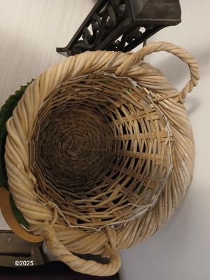 Variety of baskets and a lamp with a large lampshade