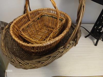 Variety of baskets and a lamp with a large lampshade