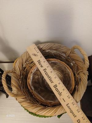 Variety of baskets and a lamp with a large lampshade
