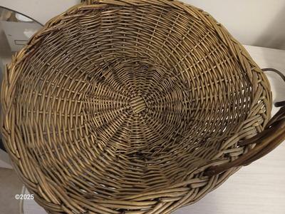 Variety of baskets and a lamp with a large lampshade