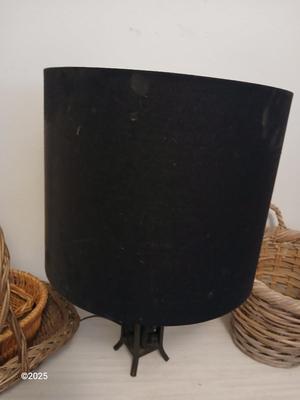 Variety of baskets and a lamp with a large lampshade