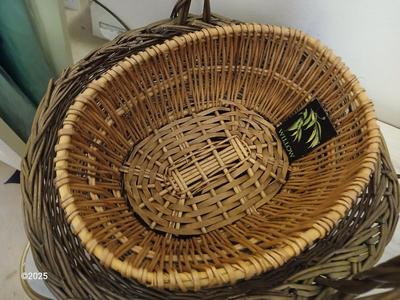 Variety of baskets and a lamp with a large lampshade
