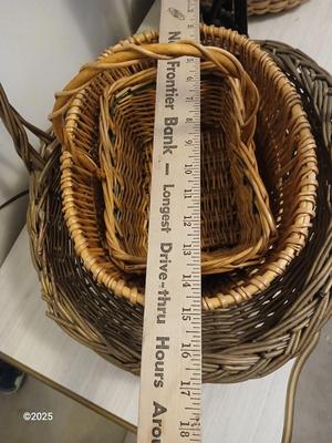 Variety of baskets and a lamp with a large lampshade