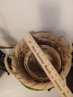 Variety of baskets and a lamp with a large lampshade