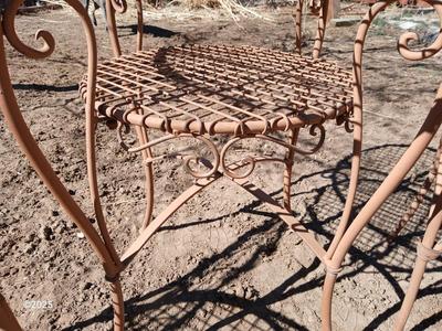 Metal bistro table with two chairs