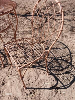 Metal bistro table with two chairs