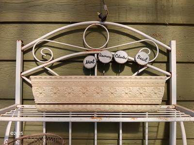 Metal bakers rack style planting station with flowerpot and more