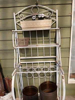 Metal bakers rack style planting station with flowerpot and more
