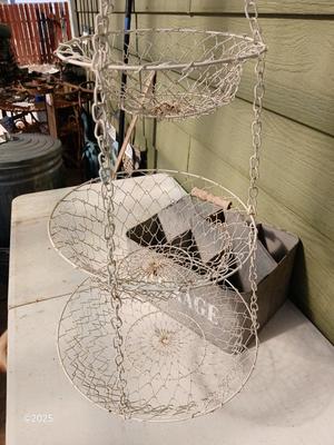 Six slot galvanized metal storage bin with three-tiered mesh hanging baskets