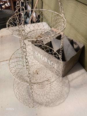 Six slot galvanized metal storage bin with three-tiered mesh hanging baskets