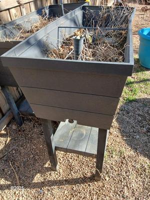 Raised garden bed with watering options and dirt (1 of 2)