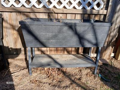 Raised garden bed with watering options and dirt (2 of 2)