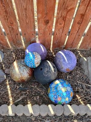 Old bowling balls for crafting - with two handmade gazing balls of sorts