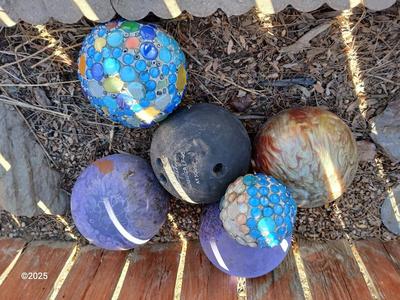 Old bowling balls for crafting - with two handmade gazing balls of sorts
