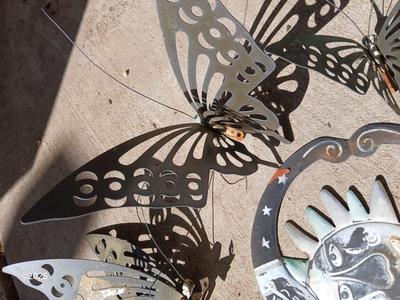 Assortment of small tin and other yard decor - yard art - butterflies - sun & moon - crosses and more