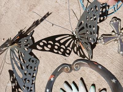 Assortment of small tin and other yard decor - yard art - butterflies - sun & moon - crosses and more