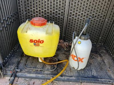 Sola backpack style weed sprayer and a handheld HDX pump weed sprayer