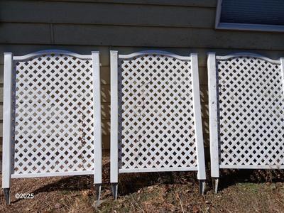Three portable Lattice trellis panels with stakes for the ground