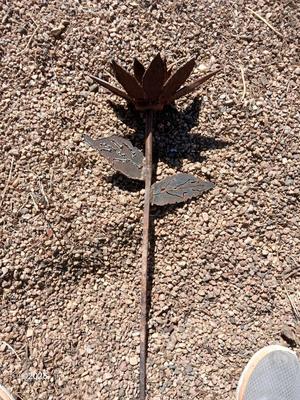 Handmade rustic yard art - flower and a horseshoe butterfly