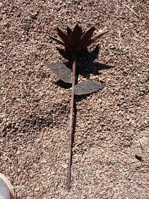 Handmade rustic yard art - flower and a horseshoe butterfly