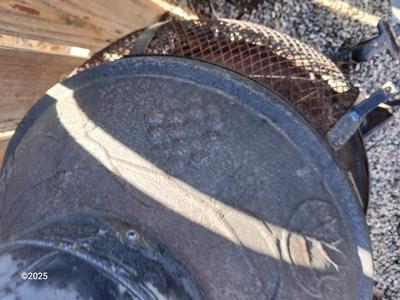 Old metal chiminea for parts. repair, or crafting