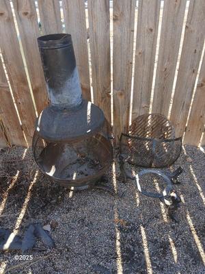 Old metal chiminea for parts. repair, or crafting