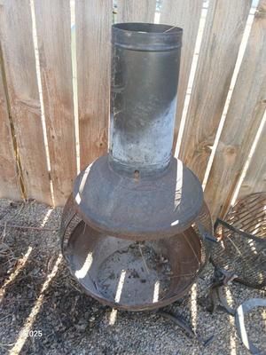 Old metal chiminea for parts. repair, or crafting