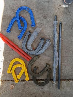 Two sets of horsehoes - one for adults - one for kids !
